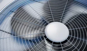 Close-up view of air conditioner fan spinning. Is your air conditioner shutting off? Call Michael Bonsby HVAC to for help!