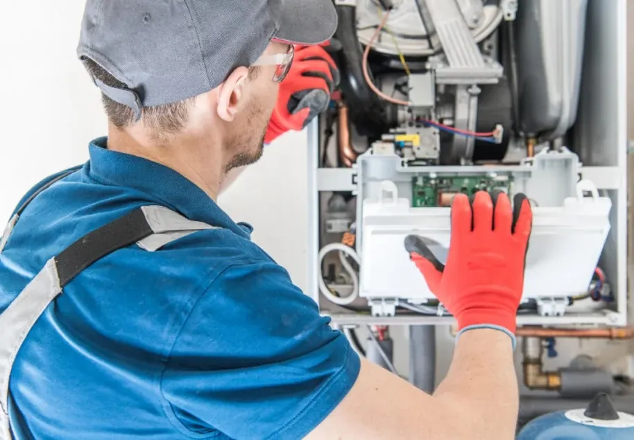 HVAC tech from Michael Bonsby HVAC repairing blow fuses