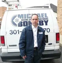 A Michael Bonsby technician behind a service van