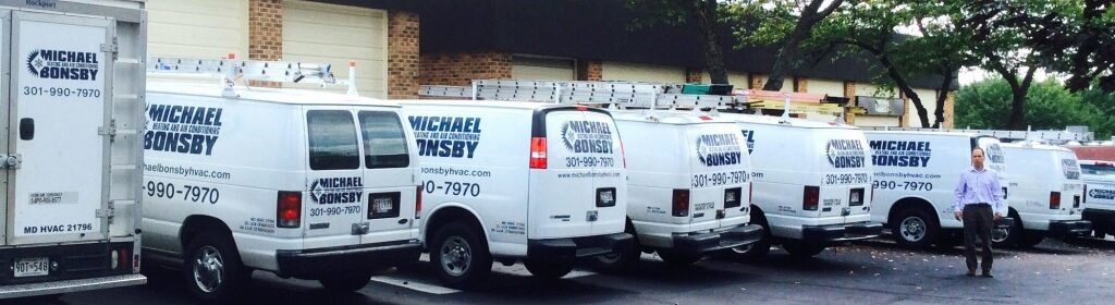 Michael Bonsby service trucks parked in a row.