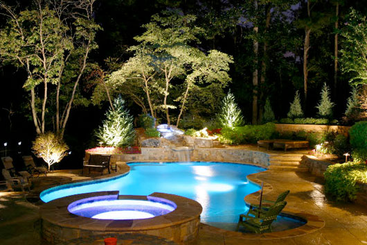 landscape lighting in pool and walkway